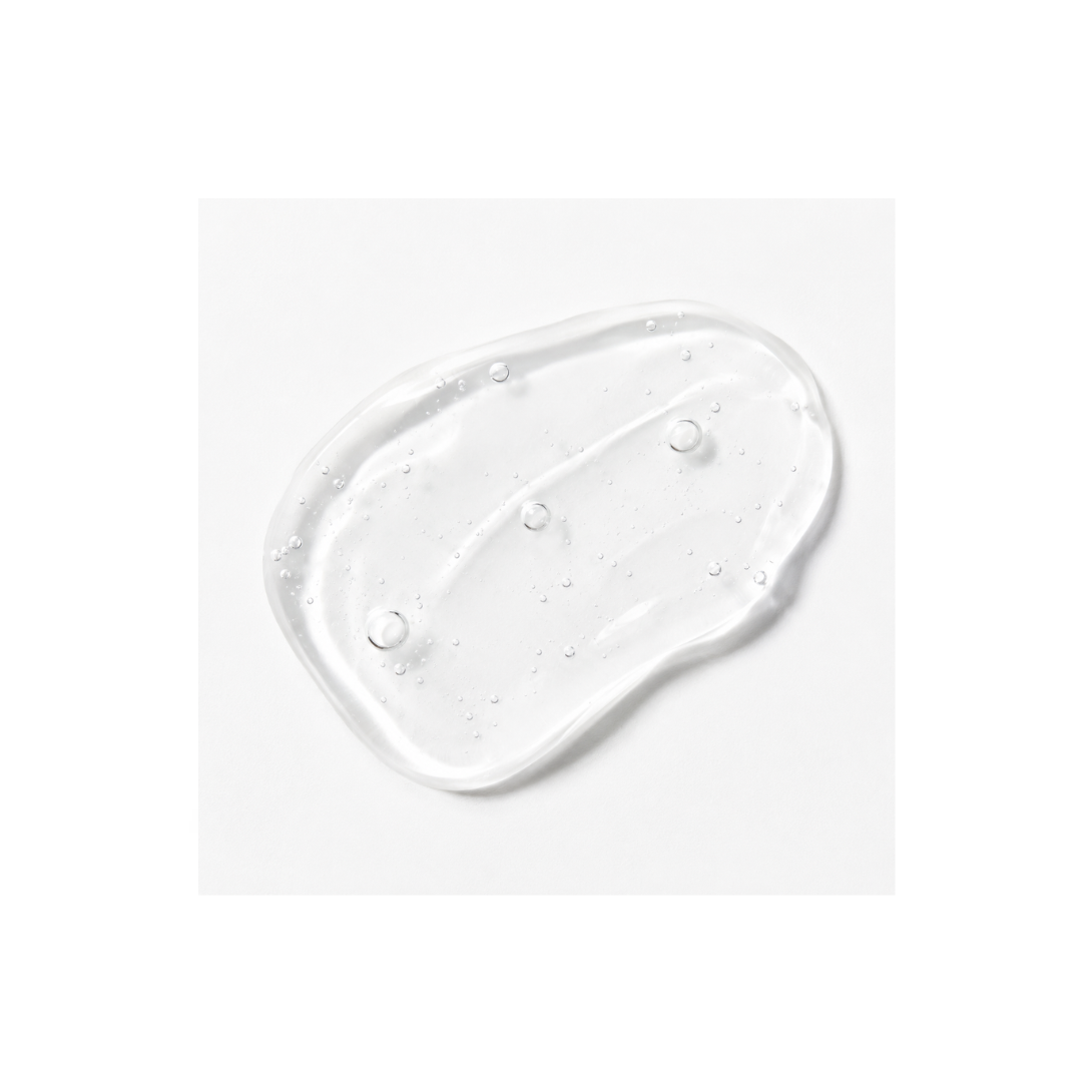 Texture of Janssen Cosmetics Radiant Skin Fluid Ampoules on a white background.